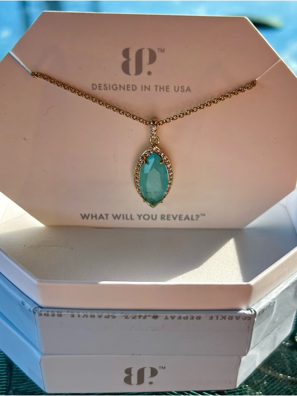 bp og lab created aquamarine fused with genuine quartz. Gold plating